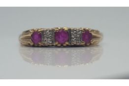 9Ct Yellow Gold Ladies Ruby And Diamond Ring, Set With Oval Cut Rubies, Total Weight- 1.79 Grams