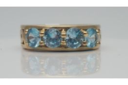 9Ct Yellow Gold Ladies Ring, Set With Approx 1.20 Carats Of Blue Topaz Stone, Total Weight- 3.89