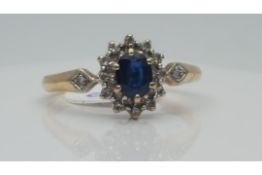 9Ct Yellow Gold Ladies Diamond And Sapphire Ring, Set With An Oval Cut Sapphire Stone, Total Weight-