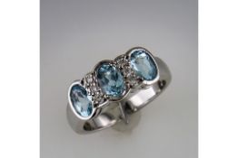 A New 3 Stone Aquamarine and Diamond Ring