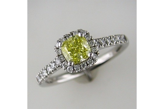 A Superb New Diamond Halo Ring set with a Fancy Intense Yellow Cushion Cut Diamond