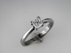 A New 0.4 carat Princess Diamond Solitaire