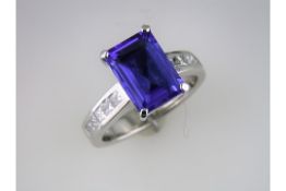 A New Top Quality Tanzanite and Diamond Ring.