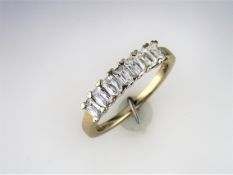 A "Fully Restored" 7 Stone Baguette Cut Diamond Ring