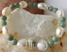 Jadeite stretchy bracelet with freshwater cultured pearls and 925 Silver Buddha and 925 Sterling