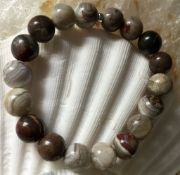 Real Lacey Agate rounds on a stretchy bracelet with 925 silver spacer easy to wear look at Gems