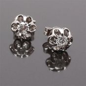earrings in white gold, stamped 750 with 2 diamonds 2x0.22 ct = 0.44 ct Color H Clarity P-1 Weight