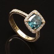 Ring in 14K yellow gold with diamonds, total 2.01 ct Centered diamond, 1.61 ct Color: Fancy blue.