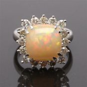 Carmo ring in white gold, stamped 585, size 17,5 / 55 with opal with dimensions 11,5x11,6 mm and