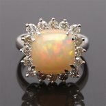 Carmo ring in white gold, stamped 585, size 17,5 / 55 with opal with dimensions 11,5x11,6 mm and