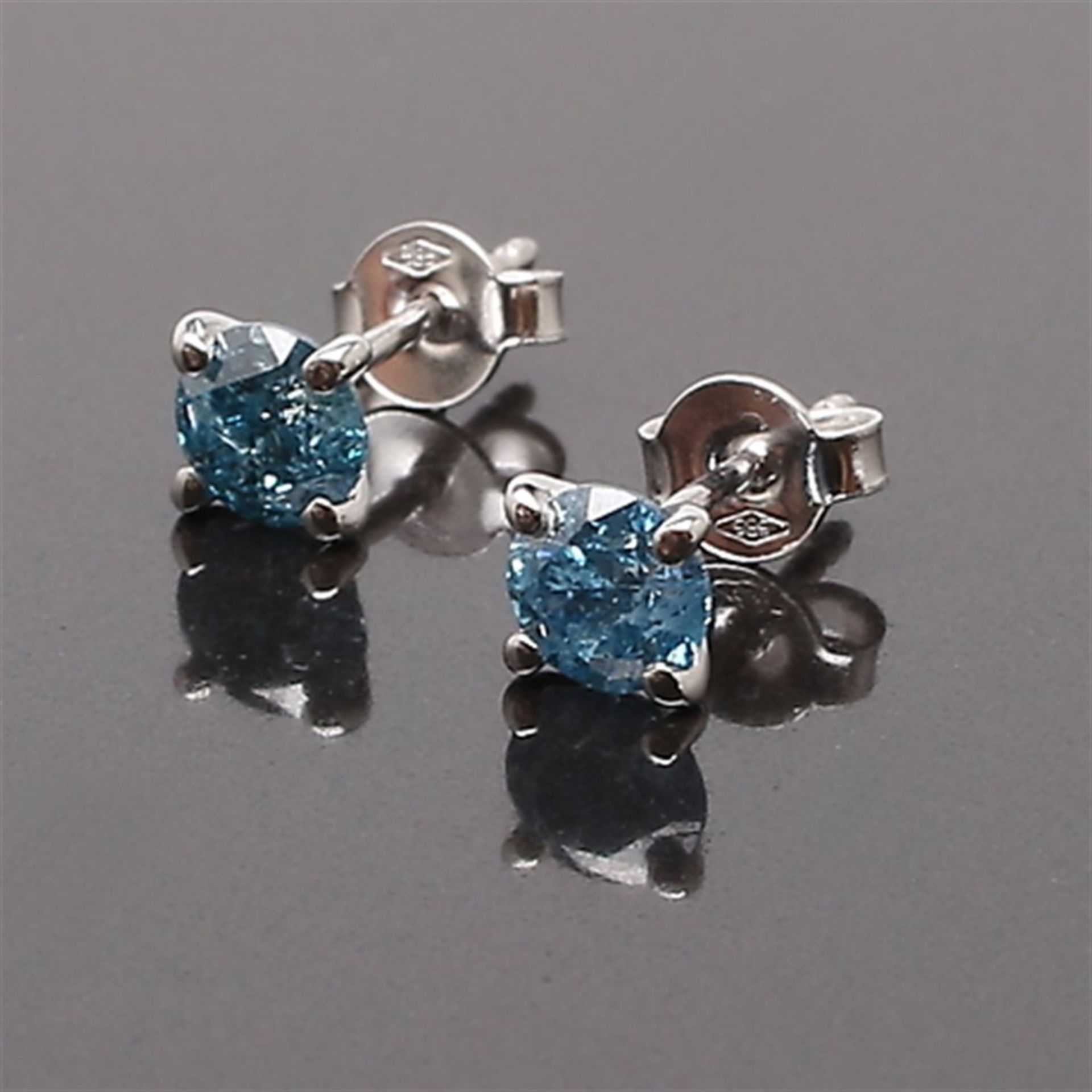 Solitaire Earrings in White Gold, Stamped 585 With Diamonds 1.04 ct Color Fancy Blue Clarity P1.