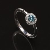 Ring white gold with diamonds totaling 0.39 ct Diamonds 0.25 ct Color fancy Blue Clarity SI-2