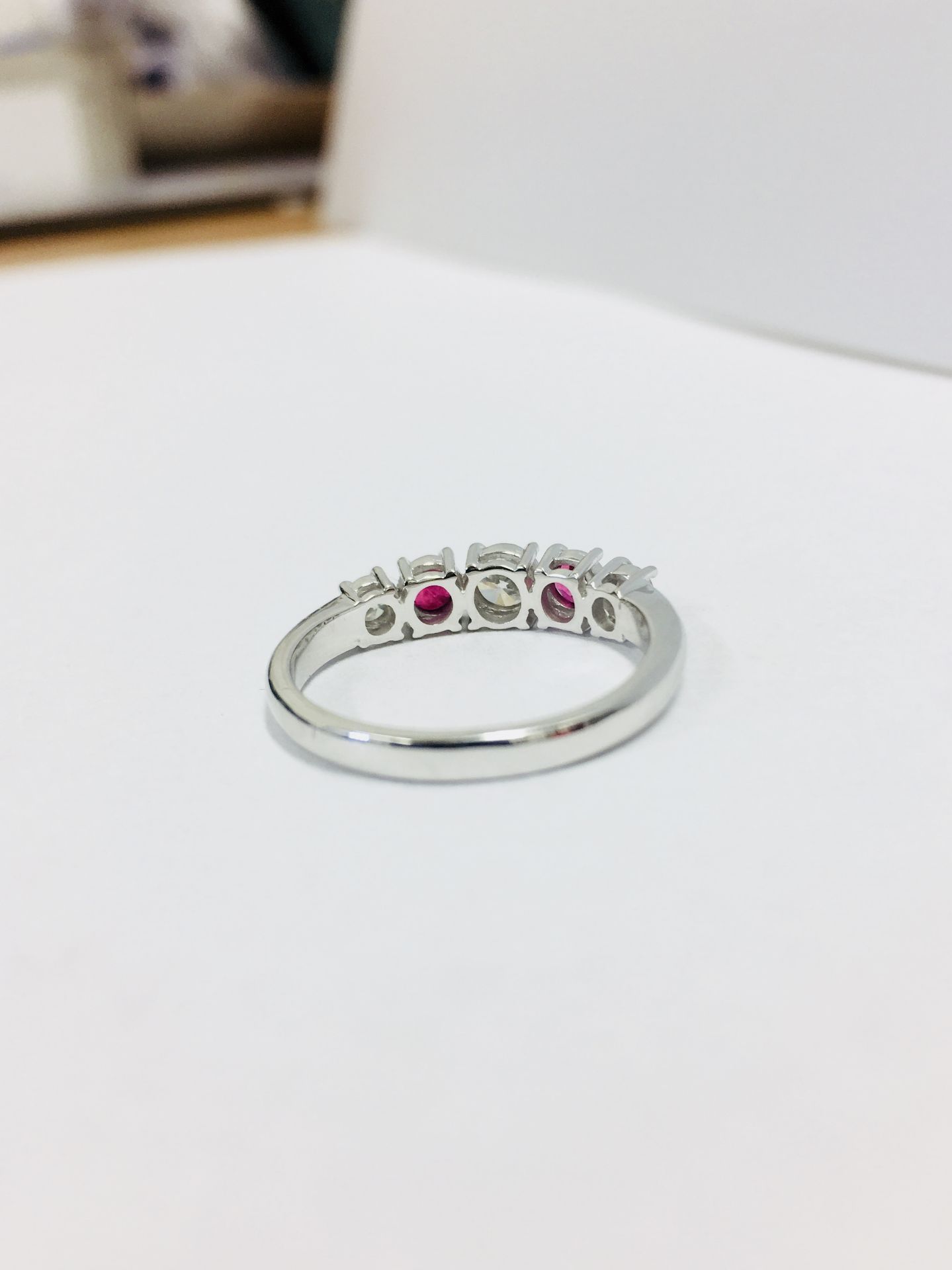 0.75ct ruby and diamond five stone ringset in 18ct gold. 2 rubies( treated ) 3 brilliant cut - Image 3 of 4