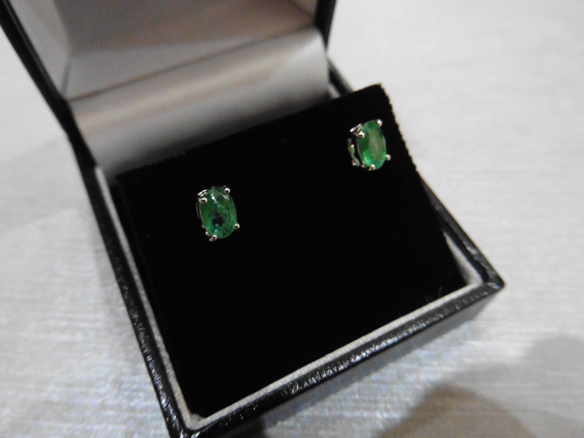 0.60ct emerald stud style earrings set in 9ct white gold. 6 x 4mm oval cut emeralds ( treated) set - Image 3 of 3