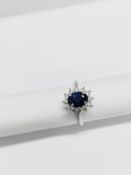 Platinum Sapphire diamond cluster ring,1ct Sapphire (treated),0.36ct diamonds si2 I Colour,3gms