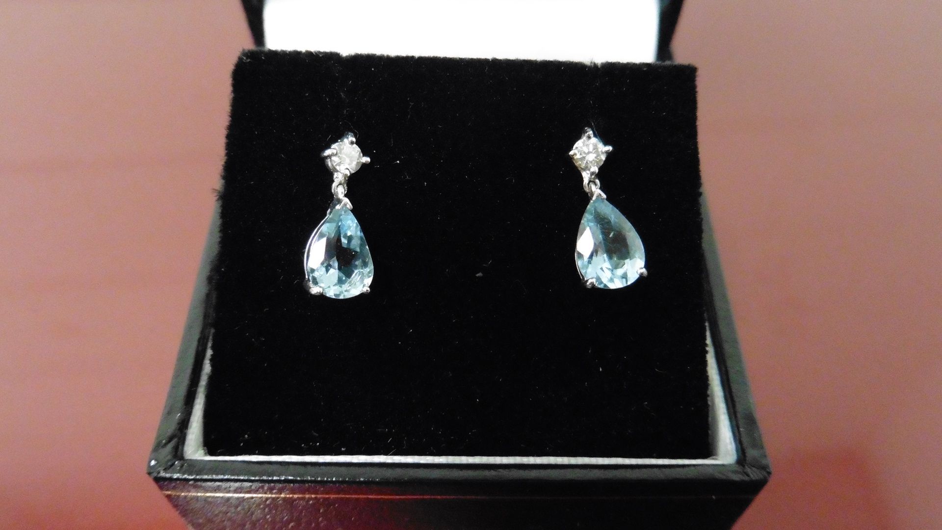 0.70ct drop style earrings. Each set with a pear shaped Aqua marine ( treated ) and a small - Image 2 of 2