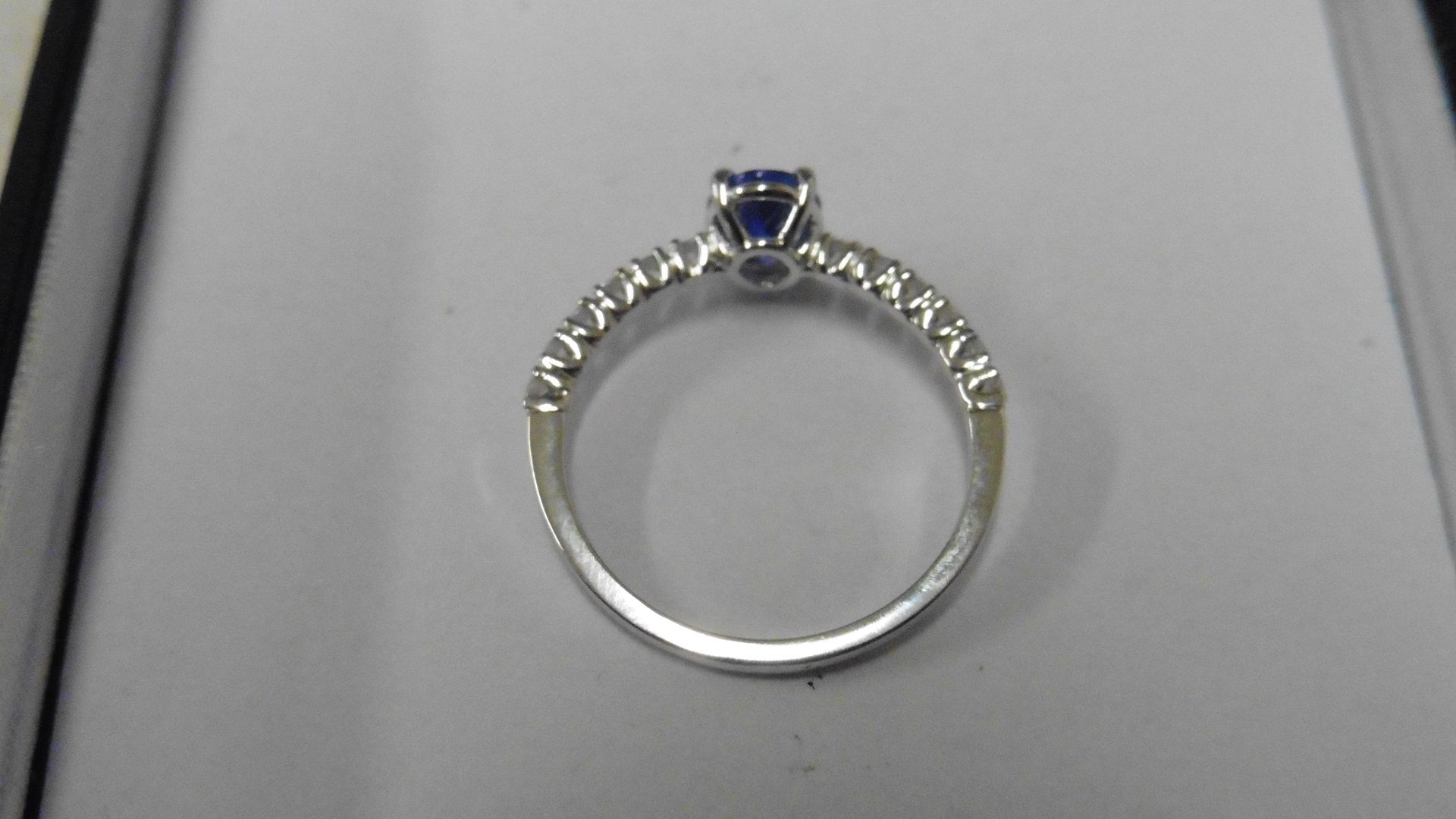 0.80ct / 0.12ct tanzanite and diamond dress ring. Oval cut ( treated ) tanzanite with small diamonds - Image 2 of 3