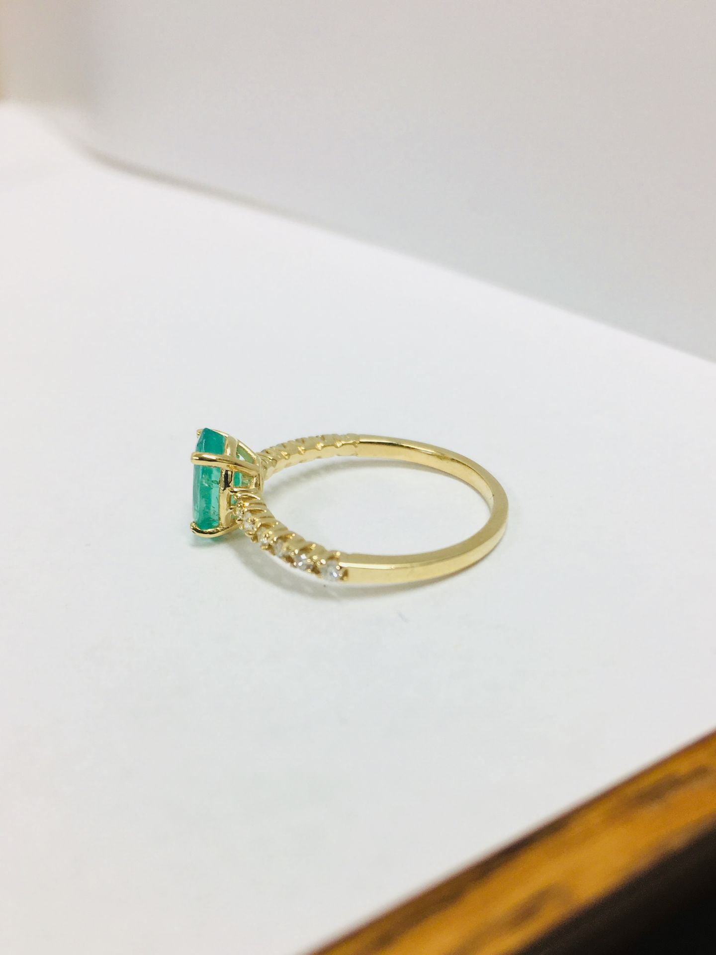 0.80ct / 0.12ct Emerald and diamond dress ring. Oval cut ( oil treated) emerald with small - Image 3 of 4