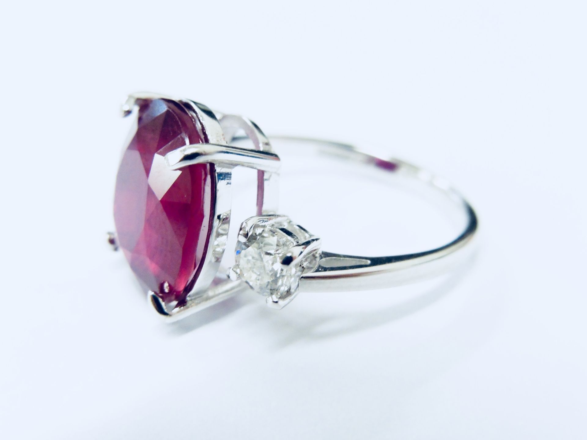 18ct Ruby diamond three stone ring,8.50ct Ruby(treated) 0.60ct diamonds (0.30ctx2) si2 I Colour ,4. - Image 2 of 4