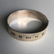 A retro engraved silver bangle - hallmarked Birmingham 1977