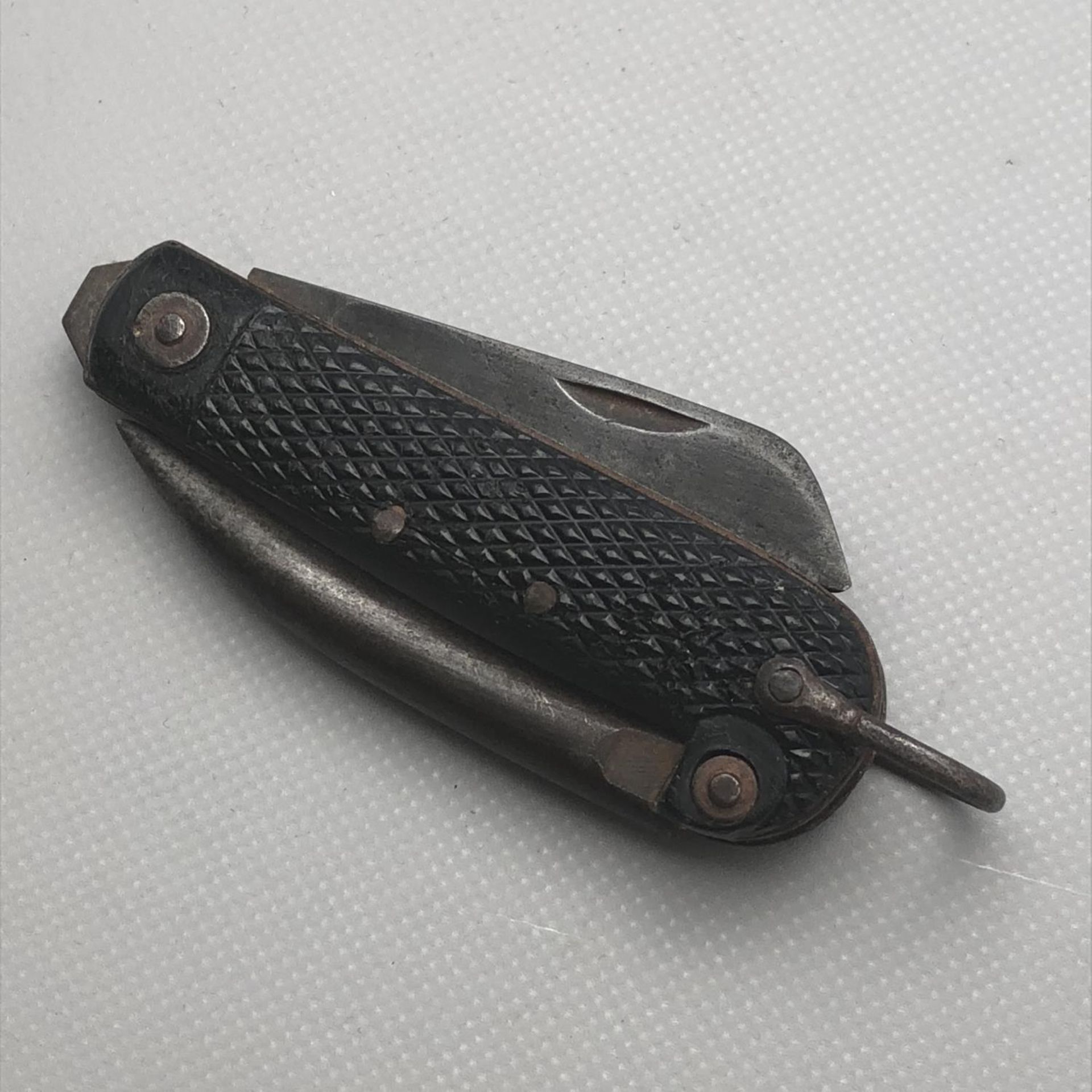 A British Military Issue Pocket clasp knife with marline spike and tin opener - Image 4 of 6