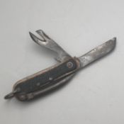 A British Military Issue Pocket clasp knife with marline spike and tin opener