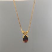 Beautiful oval solitaire red garnet stone pendant on 9ct/9k gold chain, 375