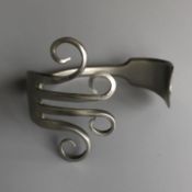 A vintage silver plate fork crafted into a bracelet