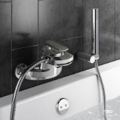 (T269) Oshi Wall Mounted Waterfall Bath Tap with Hand Held Shower Head Presenting a contemporary