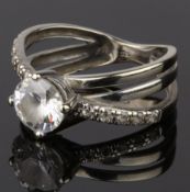 A CUBIC ZIRCONIA SOLITAIRE RING (NO HALLMARKS - STAMPED 375)