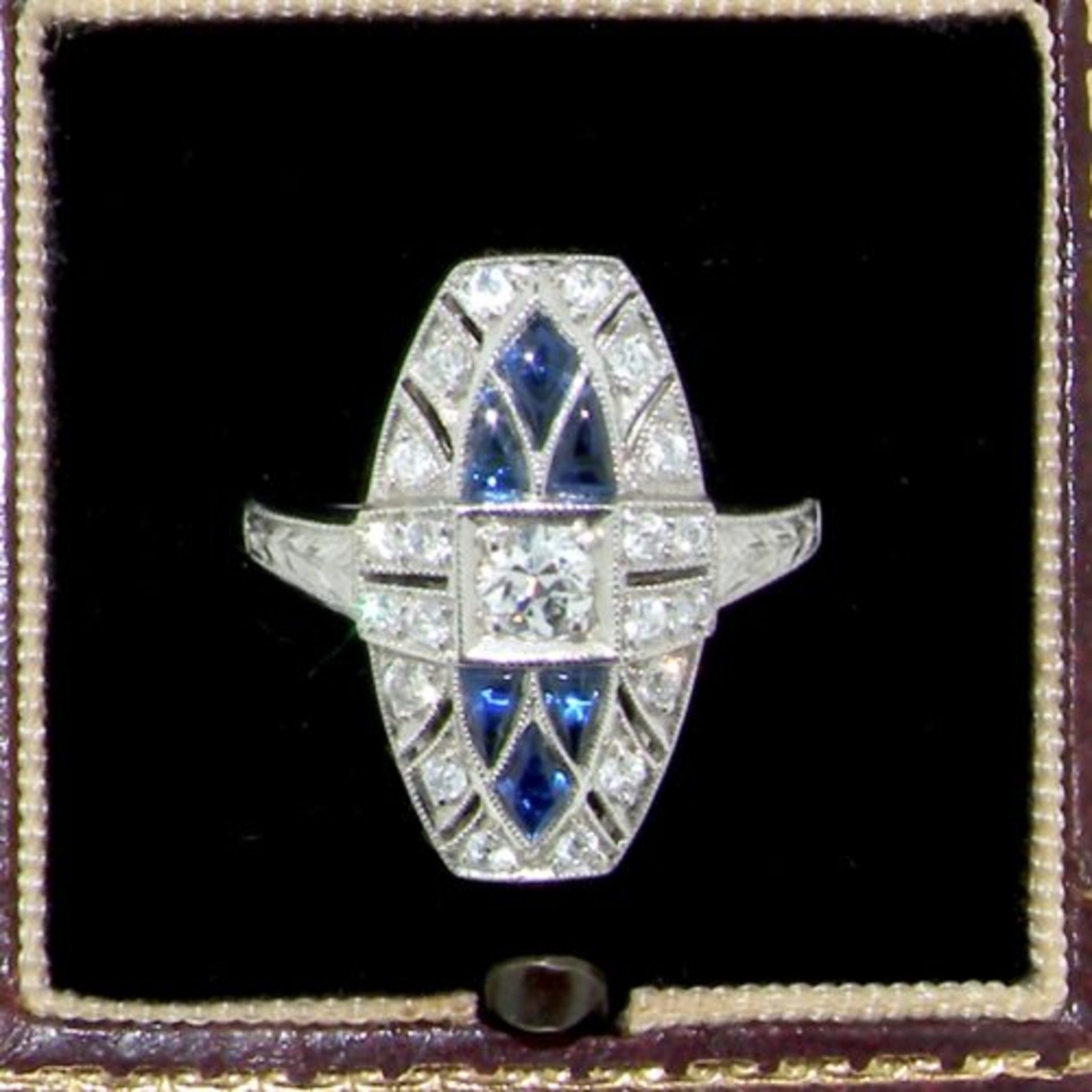 A Platinum Art Deco Sapphire And Diamond Ring
