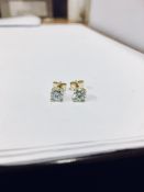 1.40ct Diamond solitaire earrings set with brilliant cut diamonds, I colour I1 clarity. Four claw