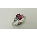 Ruby and diamond trilogy ring. 1ct, 7 x 5mm oval ruby ( fracture filled ) with a brilliant cut