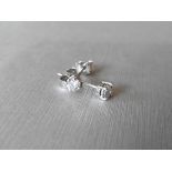 0.40ct diamond solitaire stud earrings set in platinum. I colour, si2-3 clarity.4 claw setting