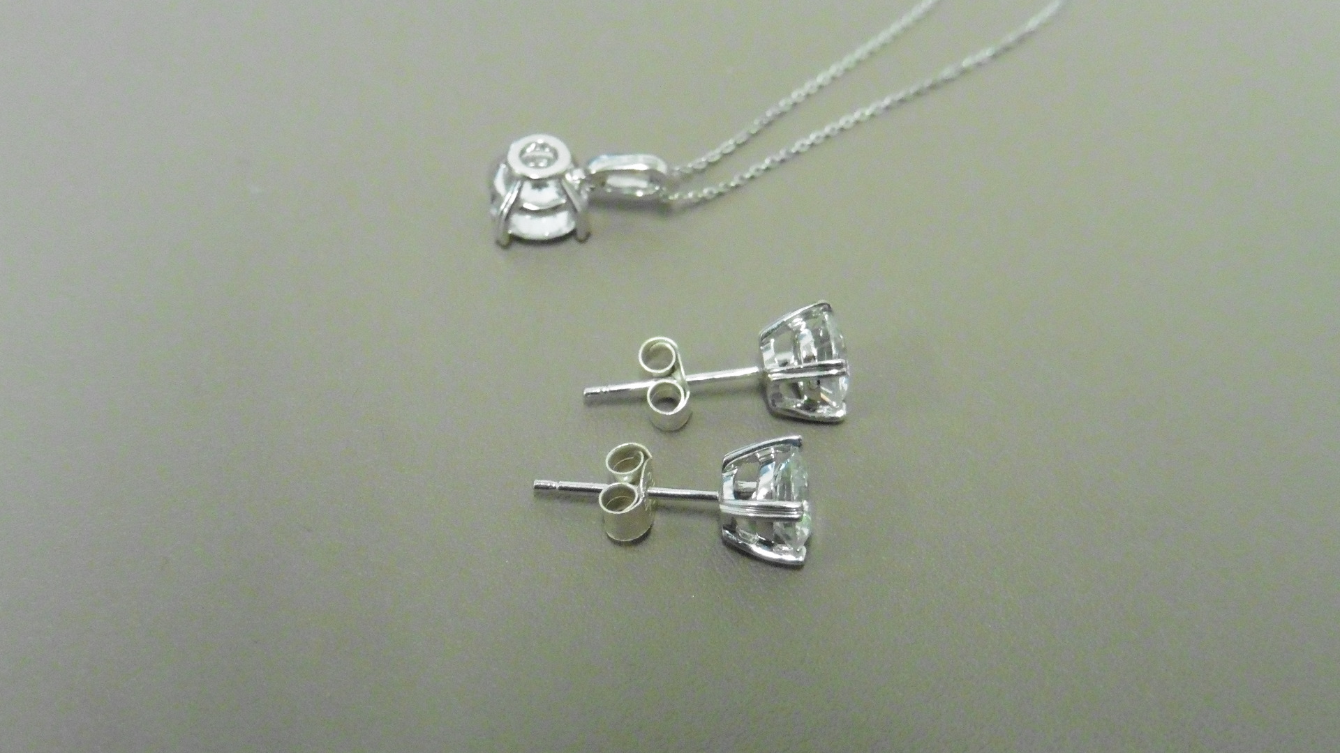 0.45ct / 0.80ct diamond pendant and earring set in platinum. Pendant - 0.40ct brilliant cut diamond, - Image 2 of 2