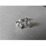 1.40ct Solitaire diamond stud earrings set with brilliant cut diamonds. I colour, I1 clarity Set