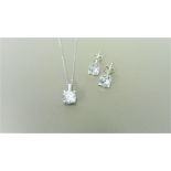 0.30ct / 0.50ct diamond pendant and earring set in platinum. Pendant - 0.30ct brilliant cut diamond,