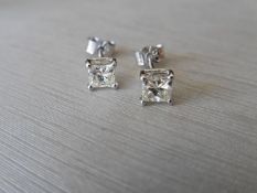 Platinum princess cut diamond earrings.0.70ct diamond ,si3 clarity h colour(0.35ct each),
