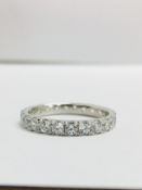 1.50ct full diamond band ring. Brilliant cut diamonds, I colour, si3 clarity. Claw setting. Size
