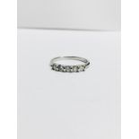 0.50ct diamond five stone ring. Brilliant cut diamonds, I colour and si3 clarity. Claw setting in
