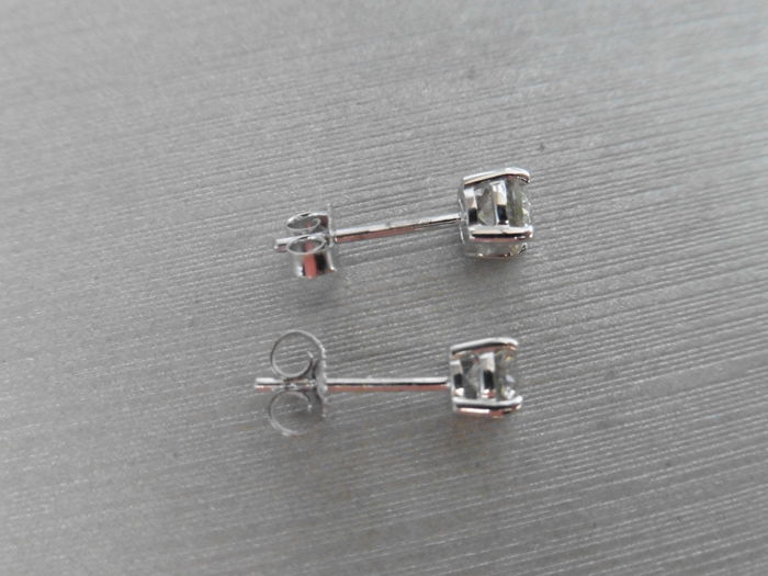0.80ct diamond solitaire stud earrings set in platinum. I/J colour, si2 clarity.4 claw setting - Image 2 of 2