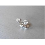 0.70ct diamond solitaire stud earrings set in platinum. I/J colour, si2 clarity.4 claw setting