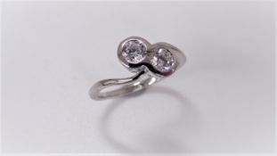 1ct two stone twist ring set in platinum. Brilliant cut diamonds, I/J colour, si2 clarity weighing