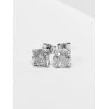 2.02ct Solitaire diamond stud earrings set with brilliant cut diamonds. I colour, I1 clarity Set