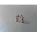 0.60ct trilogy drop earrings set in 18ct white gold.Brilliant cut diamonds, I colour and Si2-3