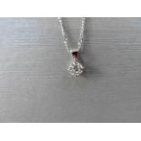 0.40ct diamond solitaire pendant set in 18ct gold. Off set 4 claw setting,plain bale. I colour and