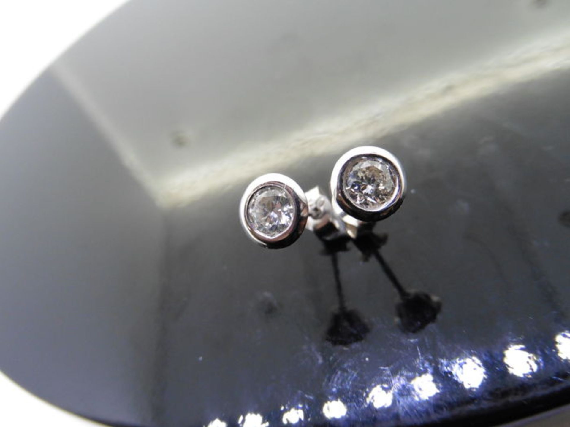 0.50ct diamond solitaire style stud earrings. Brilliant cut diamonds, I/J colour, si2 clarity. Set