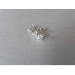 0.80ct Solitaire diamond stud earrings set with brilliant cut diamonds, SI2 clarity and I colour.