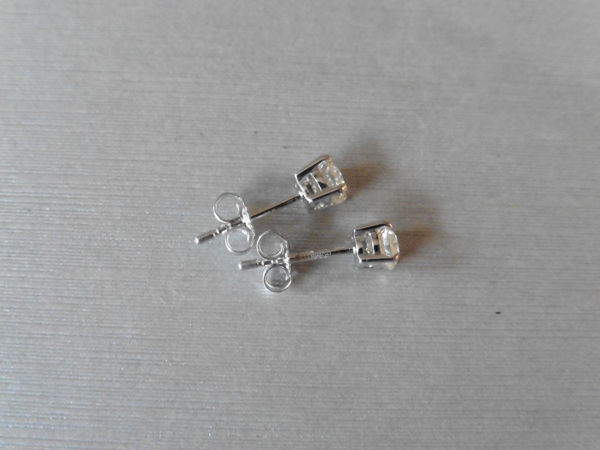 0.80ct Solitaire diamond stud earrings set with brilliant cut diamonds, SI2 clarity and I colour. - Image 2 of 2
