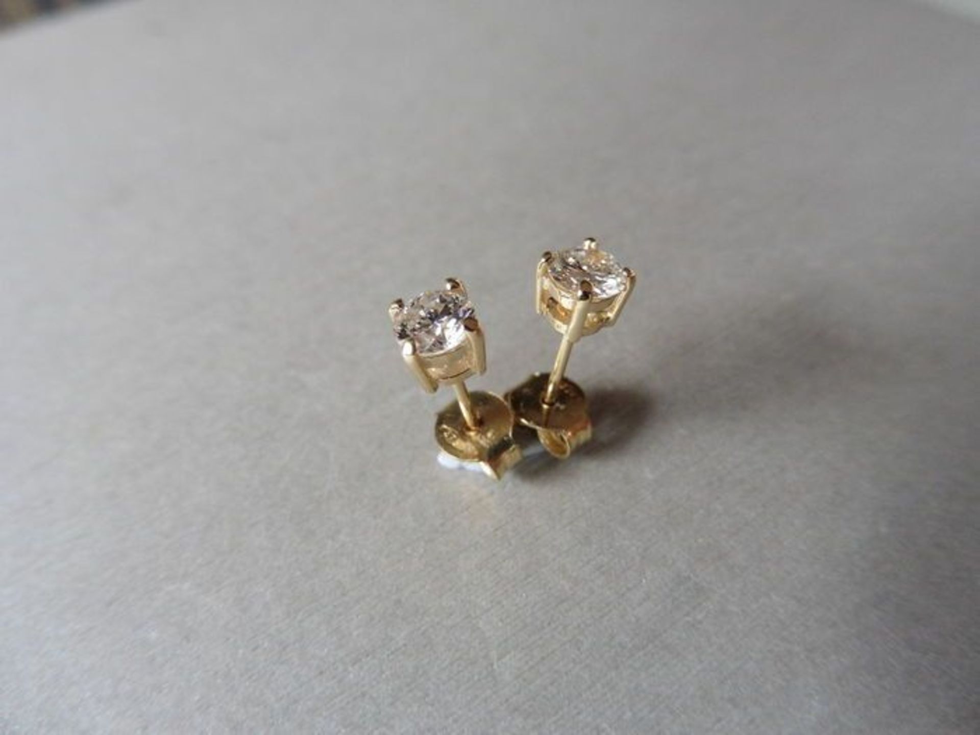 0.50ct Solitaire diamond stud earrings set with brilliant cut diamonds, SI2 clarity and I colour.